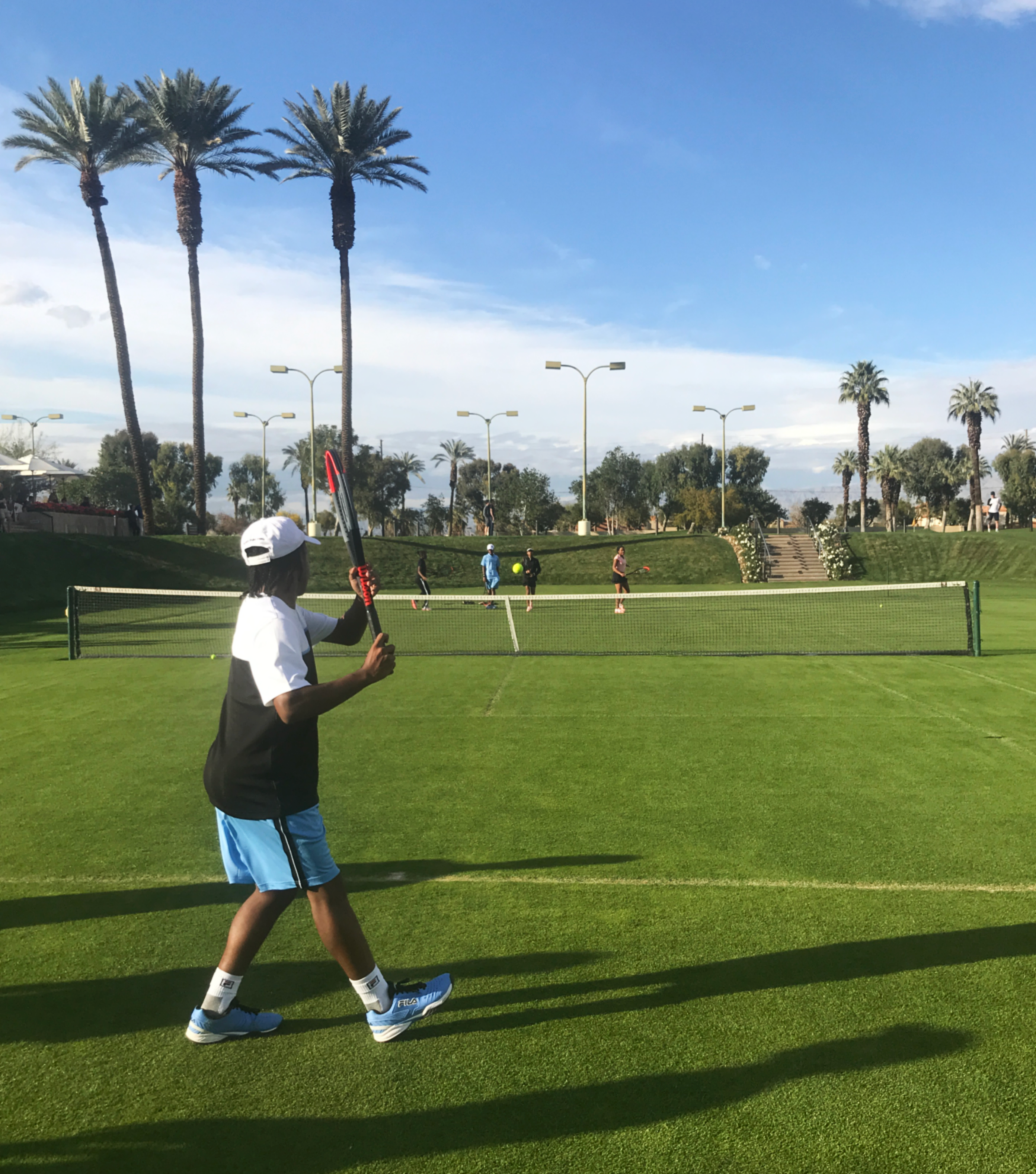 Finalist of the Tie Break Tens Challenger, Romero, tests out his new Wilson Clash Racket